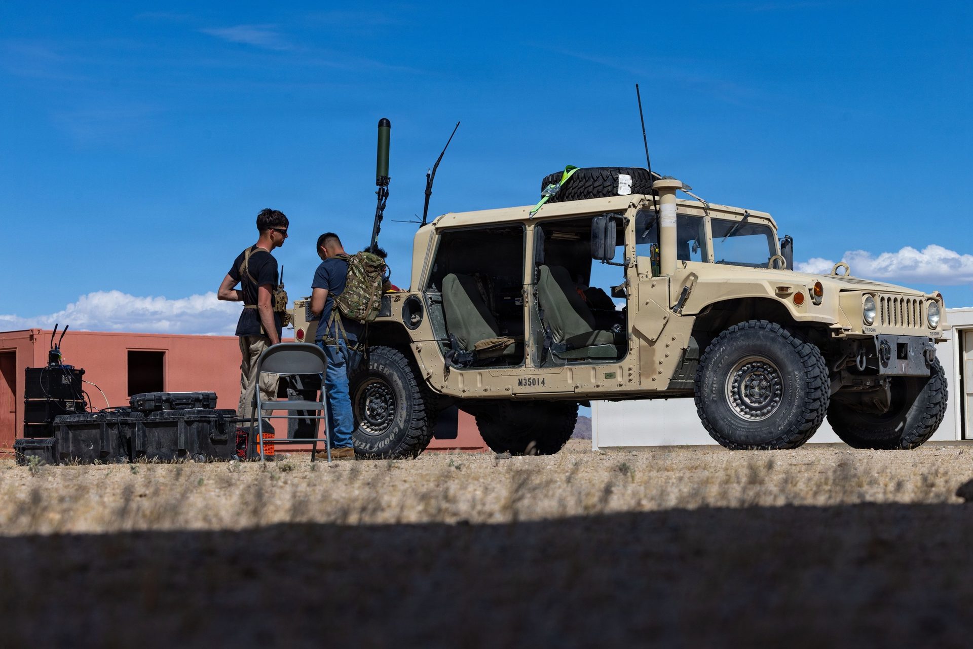 Service members operating vehicle-mounted RF equipment